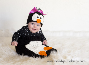 Baby in Crochet Penguin Outfit