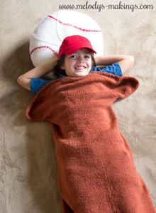 knit baseball bat blanket and baseball pillow